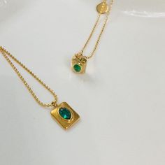 This minimalist necklace is designed with a charming emerald pendant measuring 8mm x 9mm (0.8cm x 0.9cm), this necklace offers understated beauty that complements any outfit. The adjustable chain allows for versatile styling, ranging from 42cm to 45cm in length, ensuring a perfect fit for every neckline. *18ct gold-plated tarnish-free chain necklace *Green stone beaded chain *Waterproof emerald zircon square pendant *Elegant and durable design *Tarnish-free and water-resistant *Ideal for women o Tarnish Resistant Gold Plated Green Necklaces, Emerald Necklace With Delicate Chain As Gift, Emerald Necklace With Delicate Chain For Gift, Minimalist Everyday Emerald Pendant Necklace, Tarnish Resistant Green Gold Plated Necklaces, Tarnish Resistant Green Gold Plated Necklace, Minimalist Emerald Necklace Clavicle Chain As Gift, Minimalist Emerald Clavicle Necklace As Gift, Dainty Emerald Pendant Necklace For Everyday