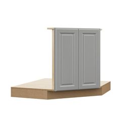 a gray cabinet sitting on top of a wooden platform