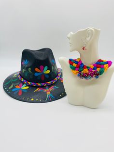 Hand painted Mexican Artisan Set, Hand painted HAT, matching NECKLACE and EARRINGS perfect addition of color, style, and beauty, It's completely handmade that means lovely made!! MEASUREMENTS SIZE Medium 23 Inches circumference * All items are hand made some times could be minimal differences When you buy from LAND CRAFT, you are not just buying a product or pieces full of love, tradition, and culture, you are supporting our small business and all the artists that make this beautiful crafts. Most importantly, we can continue to support and empower the talented artisans from rural communities in Mexico by providing them the opportunity to share their amazing talents and also helping to ensure their history remains alive and helps them to open opportunities to have a better life. We are open Adjustable Multicolor Hand Painted Necklace, Bohemian Hand Painted Jewelry For Summer, Artistic Multicolor Summer Jewelry, Artisan Multicolor Hats As Gifts, Handmade Multicolor Hat As A Gift, Multicolor Hand Painted Jewelry For Festivals, Hand Painted Adjustable Jewelry For Festivals, Whimsical Multicolor Hand Painted Jewelry, Hand Painted Bohemian Jewelry For Parties