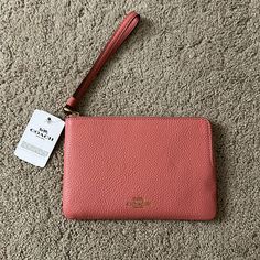 Brand New Peach/Pink Wallet With Tags Never Used. Still Has Tissue In. Everyday Pink Clutch Wallet, Coach Pink Wallets For Travel, Pink Coach Wallet For Travel, Coach Pink Clutch For Everyday Use, Pink Coach Clutch For Travel, Pink Pouch Wallet For Everyday, Everyday Pink Pouch Wallet, Pink Everyday Pouch Wallet, Daily Use Pink Coach Clutch