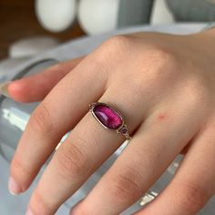 Bright magenta sapphires flank the shoulders of this rosecut pink tourmaline. Set in 14k yellow gold with Emily's signature seagrass band its destined to become a favorite. Approximate stone size: 12mm x 7mm Approx ct weight: 2.3cts Mohs Hardness: 7-7.5 This one of a kind piece is handmade with love in Emily's Hudson Valley studio and ready to size and ship. If you have questions about sizing, shipping or custom orders please reach out to us! Pink Tourmaline Rings With Gemstone Accents, Oval Pink Tourmaline Ruby Ring, Pink Tourmaline Jewelry With Accent Stones, Pink Sapphire Ring With Bezel Setting In 14k Gold, Pink Sapphire Ring In 14k Gold With Bezel Setting, 14k Gold Pink Sapphire Ring With Bezel Setting, Rose Gold Ruby Tourmaline Ring, Pink Ruby Ring With Bezel Setting, Pink Ruby Ring With Bezel Setting In 14k Gold