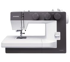 the janome sewing machine is white and grey with buttons on it's side