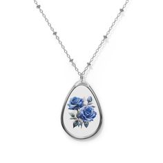 Introducing our Blue Rose Flower Necklace, an enchanting and unique piece that embodies the beauty and mystique of the rare blue rose. This necklace is a symbol of elegance and intrigue, perfect for adding a touch of enchantment to any outfit or gifting to someone special who appreciates the extraordinary. The pendant and its chain are made with robust brass material for dazzling looks that are long-lasting. The print panel is made with aluminum while the pendant itself comes in a unique shape of an ellipse. -Zinc alloy pendant and necklace chain -Ellipse-shaped pendant -White aluminum print surface Blue Birth Flower Jewelry For Anniversary, Elegant Blue Jewelry With Birth Flower, Elegant Blue Necklaces For Mother's Day, Blue Elegant Necklace For Mother's Day, Blue Flower Necklaces For Mother's Day, Bridesmaid Gifts Unique, Unique Bridesmaid, Etsy Bridesmaid Gifts, Rose Necklace