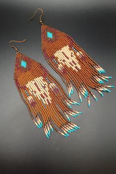 two pairs of beaded earrings with fringes