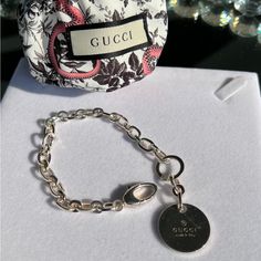 Absolutely Gorgeous Chain Bracelet With Stunning Gucci Pendant On Heavy Strong 925 Silver Great Gift Come With Beautiful Snack Original Dust Bag And Card New Luxury Gucci Chain Bracelet As Gift, Luxury Gucci Chain Bracelet, Elegant Gucci Chain Bracelet For Gift, Classic Gucci Jewelry With Silver-tone Logo Plaque, Gucci Silver Jewelry With Silver-tone Logo Plaque, Gucci Silver Jewelry With Silver-tone Logo, Gucci Silver Jewelry With Logo Plaque, Elegant Gucci Jewelry With Silver-tone Logo Plaque, Elegant Gucci Jewelry With Silver-tone Logo