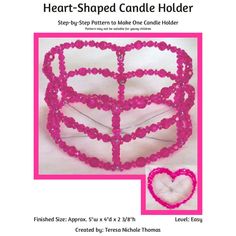 the heart shaped candle holder is made from plastic beads and beaded with pink thread