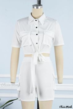 Olivia Mark - Womens Elegant White Two-Piece Casual Outfit Featuring a Stylish Solid Bandage Patchwork and Buckle-Accented Turndown Collar White Short Sleeve Sets With Pockets, White Sets With Pockets And Short Sleeves, White Fitted Jumpsuit With Tie Waist, White Short Sleeve Jumpsuits And Rompers For Work, White Fitted Jumpsuits And Rompers With Tie Waist, Fitted White Jumpsuits And Rompers With Tie Waist, Green Two Piece, 2piece Outfits, White Two Piece