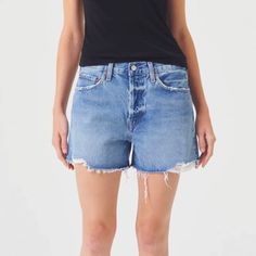 Not only cute but extremely comfortable. The jean shorts you will be reaching for all season long. Relaxed fit. High-rise with just enough room in the thighs. Button fly. Raw hem. Crafted in 100% Regenerative Cotton. Bow Heels, Long Shorts, Wide Leg Jumpsuit, Jean Shorts, Wide Leg, High Rise, Jumpsuit, Relaxed Fit, Denim Shorts