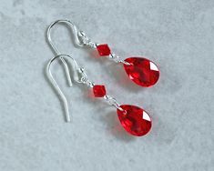 Bright Red Austrian Crystal Teardrop Earrings July Birthstone Crystal Earrings - Etsy Red Drop Crystal Earrings As Gift, Red Sterling Silver Drop Crystal Earrings, Red Sterling Silver Crystal Drop Earrings, Faceted Teardrop Red Jewelry, Red Teardrop Crystal Earrings, Red Sterling Silver Dangle Crystal Earrings, Red Hypoallergenic Teardrop Earrings, Red Hypoallergenic Drop Jewelry, Hypoallergenic Red Drop Jewelry