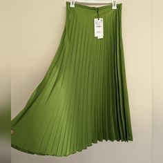 Shop chomoonlight's closet or find the perfect look from millions of stylists. Fast shipping and buyer protection. Thick and smooth, flowy satin effect pleated skirt with a beautiful sheen on every swish. Side zipper closure. S: waist: 13.5" M: waist: 14.5" Light Green Skirt, Dream Fashion, Zara New, Zara Skirts, Green Skirt, Women Skirts Midi, Maid Of Honor, Pleated Skirt, Side Zipper