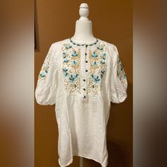 Boutique Purchase-White Tunic Top With Embroidered Accents To The Front And Sleeves. Size Xl Measurements In Photos New-Never Worn Casual White Blouse With Floral Embroidery, White Casual Top With Floral Embroidery, White Embroidered Blouse For Vacation, White Embroidered Short Sleeve Top With Relaxed Fit, White Embroidered Hem Blouse For Vacation, White Embroidered Top With Short Sleeve, White Embroidered Top With Short Sleeves, Relaxed Fit, White Top With Geometric Embroidery For Vacation, White Geometric Embroidered Short Sleeve Top