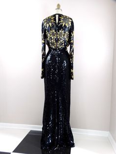 "This is a STUNNING vintage gown from couture designer, Stephen Yearick! It is heavily and fully embellished with sequins, glass beading and crystal rhinestones.. the details are ABSOLUTELY AMAZING It's in PERFECT condition! Measurements: Bust - 32/34\" Waist - 26/28\" Hips - 36/38\" Length - 60\" in the front / 63\" in the back All of my items come from a smoke-free home. If you would like more info or have any questions, please don't hesitate to ask!" Luxury Fitted Sequin Gown, Couture Sequin Gown For Formal Occasions, Fitted Luxury Evening Dress With Contrast Sequin, Couture Evening Gown With Sequins, Glamorous Formal Evening Dress With Embroidery, Fitted Floor-length Gown With Contrast Sequin, Luxury Fitted Floor-length Sequin Dress, Fitted Luxury Gown With Rhinestones, Luxury Fitted Gown With Rhinestones