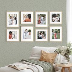 a living room with pictures on the wall and a couch in front of it next to a window