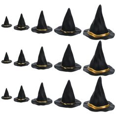 a set of black and gold witches hats on top of each other, all in different sizes