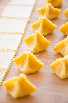 small dumplings are lined up on a table