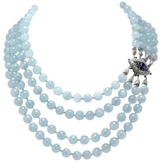 SHIPPING POLICY: No additional costs will be added to this order. Shipping costs will be totally covered by the seller (customs duties included). PS: THIS POLICY IS NOT APPLICABLE TO ITEMS WITH FIX PRICE, ITEMS AT AUCTIONS AND ONGOING PROMOTIONS. Classic and charming aquamarine beads necklace , embellished with a clasp of 18 Kt white gold composed of diamonds and blue sapphires cabochon cut. Tot weight 270.5 g Aquamarines 249.70 g Diamonds 2 ct Blue Sapphires 2.96 ct Rf. guacu For any inquiries, Woman Jewelry, White Gold Necklace, Aquamarine Beads, Gold Bead Necklace, Gold Diamond Necklace, White Gold Necklaces, White Gold Jewelry, White Necklace, Handcrafted Necklace