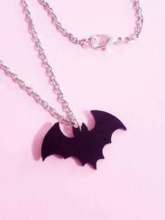 Customizable Bat Necklace ♡ Example Color: Black♡ Pendant Size: 1.25" x 0.75" ♡ Lobster Clasp closure♡ All jewelry is lead and nickel free so it's 100% safe for anyone with metal allergies Necklaces cannot be exchanged, returned, or refunded, but if there is a problem with your order, please contact me and I would be more than happy to help. Black Themed Necklace For Halloween, Halloween Themed Black Necklace, Themed Black Necklace For Halloween, Themed Black Metal Jewelry, Black Halloween Jewelry With Adjustable Chain, Halloween Black Metal Necklace, Adjustable Black Vampire Necklace, Adjustable Black Vampire Style Necklaces, Trendy Halloween Metal Jewelry