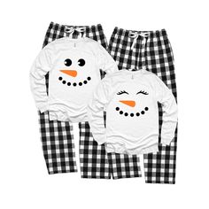 Valentine's Day Snowman Pajamas Comes with one snowman or snowman pajama set. Make selections from the drop down menu. Add as many to your cart as you like. Perfect for a cozy warm Valentine's Day weekend or fun family ski trip. These pajamas are unisex. * 100% Cotton Flannel Bottoms and Luxe Cotton Tee * Wash Cold, Tumble Dry Low * Set Long Sleeve Jammie T-Shirt with Snowman/woman design and Matching Polka Dot Flannels * Unisex Sizing provides comfortable fit for all * Perfect for Christmas Pho Black And White Matching Pajamas, Matchung Christmas Pajamas, Couples Christmas Pajamas Old Navy, Snowman Pajamas, Christmas Pajama Set With Jingle Bells Written On Them & Black & White Plaid Pants, Pajamas Matching, Monogram Kids, Matching Family Christmas Pajamas, Woman Design