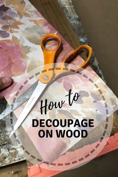 a pair of scissors on top of a piece of fabric with the words how to decouppage on wood