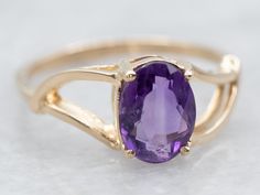 This solitaire ring features a genuine amethyst stone set in a stunning yellow gold band. Its classic style and timeless elegance are sure to add a touch of sophistication to any outfit. Perfect for a special occasion or everyday wear.Metal: 14K Yellow GoldGem: Amethyst .75 CaratsGem Measurements: 6.0 x 8.0 mm, OvalRing Size: 6.75Marks: "14K" Stamped on the inside band Yellow Gold Amethyst Ring, Amethyst Cocktail Ring, Gold Amethyst Ring, Amethyst And Diamond Ring, Gold Cocktail Ring, Gold Cocktail, Victorian Gold, Amethyst Stone, Amethyst Ring