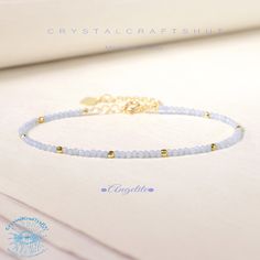 Angelite Minimalist Bracelet Light Blue Gemstone Delicate Beaded Skinny Bracelet Yoga Crystal Dainty Bracelet Adjustable 2MM Tiny Bead Stone Bracelet Gift Material : Angelite Stone, Natural Stones, Natural Crystal, Raw Stone Quality: AAA+ Length: fit for 6.3 ~ 7.3 inches wrists Beads size: 2mm Size: Adjustable It is good gift for your friends, families + Free gift pouch  Your bracelet will arrive beautifully packaged in a gift bag ,The bracelet is adjustable.  All beads are carefully selected. It is a unique and meaningful gift for yourself or someone special. Perfect cool gift that anyone will love! These happy bracelet can't help but make you smile! Add to cart today! this is one you might want to keep yourself, but would make a wonderful gift to anyone.    As you can see this is a real Elegant Friendship Bracelets With Colorful Beads, Blue Gemstone Beads Minimalist Bracelets, Minimalist Blue Gemstone Bead Bracelets, Dainty Blue Bracelets With Faceted Beads, Elegant Light Blue Beaded Chain Jewelry, Elegant Light Blue Beaded Jewelry, Adjustable Light Blue Bracelets With Faceted Beads, Light Blue Adjustable Bracelet With Faceted Beads, Adjustable Light Blue Bracelet With Faceted Beads