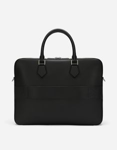 Calfskin briefcase with Dolce & Gabbana Milano logo tag: Black Top fastening with double zipper and slider with logo Calfskin top handles Front pocket with zip and branded slider and a calfskin trolley strap on the back Fabric lining with zipped pocket and flat pocket Item comes with a branded dust bag Measurements: H36.5 x W27.5 x D7 cm ?? Made in Italy Latest Bags, Bag Measurements, Briefcase For Men, Bags Logo, Logo Tag, Leather Briefcase, Black Bag, Black Cross Body Bag, Black Top