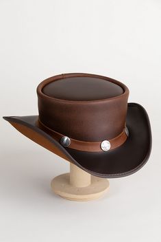 Steampunk Pale Rider Leather Top Hat with Buffalo Nickels | Overland Adjustable Country Style Top Hat For Outdoor, Western Style Adjustable Top Hat For Outdoors, Western Style Top Hat With Flat Crown For Outdoor, Adjustable Brown Top Hat For Ranch, Brown Western Top Hat For Outdoor, Leather High Crown Top Hat For Rodeo, Rustic Adjustable Brimmed Top Hat, Adjustable Vintage Brown Hats For Outdoors, Adjustable Top Hat With Flat Crown For Ranch