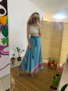 This unique wrap skirt is a one of a kind in the hole world ✨ The fabric goes on it's one unique story as it is a  one of a kind recycled vintage silk hand picked from unique places and villages 🌱 The fabric also  is so soft and silky and has so many small details that make just that much more Beautiful  ⚛️ It's a 2 in 1 skirt ! As you can where it in its 2 defrent sides✨ Skirt is great for every day, And also luxurious and Stunning for evening where. 🌞 Fabric is is the best thing about it, An Bohemian Lined Maxi Skirt For Vacation, Boho Print Long Skirt For Vacation, Bohemian Maxi Skirt For Vacation With Lined Skirt, Bohemian Vacation Lined Maxi Skirt, Bohemian Long Skirt For Vacation, Bohemian Relaxed Wrap Skirt For Spring, Hippie Lined Wrap Skirt For Spring, Bohemian Asymmetrical Wrap Skirt For Summer, Spring Hippie Long Wrap Skirt