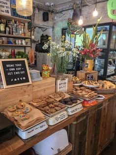 a bakery counter filled with lots of pastries