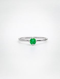 An Emerald Ring crafted from 925 silver is a stunning piece of jewelry that combines the elegance of the precious gemstone with the affordability and durability of sterling silver. Emerald, the birthstone for May, is renowned not only for its breathtaking green hue but also for its metaphysical and healing properties. This gemstone is believed to possess various attributes, including promoting love, compassion, and harmony within relationships. It is also associated with enhancing mental clarity, creativity, and intuition, making it a popular choice for those seeking personal growth and self-improvement. In the realm of physical healing, emeralds are thought to support the heart, liver, and immune system, contributing to overall well-being. Wearing an Emerald Ring can symbolize rebirth and Fine Jewelry Emerald Solitaire Rings, Emerald Solitaire Ring Fine Jewelry, Emerald Solitaire Ring In Fine Jewelry Style, Green Sterling Silver Birthstone Ring With Prong Setting, May Birthstone Open Emerald Ring, Green Birthstone Ring In Sterling Silver With Prong Setting, Sterling Silver Green Birthstone Ring With Prong Setting, Green Emerald Solitaire Crystal Ring, Emerald Solitaire Birthstone Ring