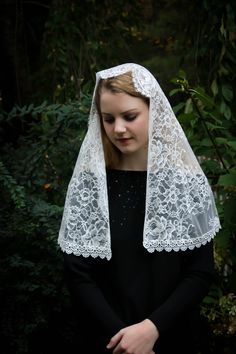 "A soft, Spanish floral lace classic D shaped veil is trimmed in cream white Venise lace trim. Soft and light, and reverent for worship. Also available in black/black trim. Please select color at checkout. Thank you to our dear customer for the beautiful photos of her wedding!! Includes sewn-in clip to hold it securely. Other options: https://www.etsy.com/listing/500708656/evintage-veils-black-spanish-lace-floral?ref=shop_home_active_17 And in a wrap-style here: https://www.etsy.com/listing/5007 Lace Veil With Lace Trim For Ceremonies, Lace Ceremony Veil With Lace Trim, Ceremony Lace Veil With Lace Trim, Elegant Lace Veil With Lace Trim, Ceremony Veil With Lace Trim, Church Lace Veil With Lace Work, White Lace Trim Veil For Ceremony, Lace Ceremony Veil, Lace Trim Veil