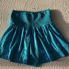 Sparkly Turquoise Skort From The Pants Store. Perfect For Rush Or Parties For Sorority Girls. Turquoise Stretch Bottoms, Fitted Blue Bottoms With Elastic Waistband, Blue Bottoms For Summer Party, Blue High Waist Shorts For Party, Blue High-waist Shorts For Party, Blue Party Bottoms For Summer, Blue Summer Party Bottoms, High Waist Blue Shorts For Party, Stretch Turquoise Bottoms For Spring