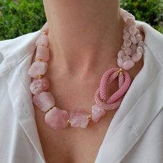 Raw rose quartz crystal necklace. Chunky statement natural gemstone beaded necklace for women. Large light pink handmade necklace with big bead and gemstone. Big bold bohemian bright necklace in gold color are suitable for an casual look, evening look and for a holiday. These necklace will be a good Christmas, anniversary, wedding or birthday gift for women, mom, wife, girlfriend, sister or daughter. Women's necklace with natural stone. It emphasizes the beauty of your neck and adds charm to you Large Bead Necklace Ideas, Big Chunky Jewelry, Pink Quartz Necklace, Bold Bohemian, Statement Necklace Wedding, Bright Necklace, Large Bead Necklace, Asymmetrical Necklace, Handmade Statement Necklace