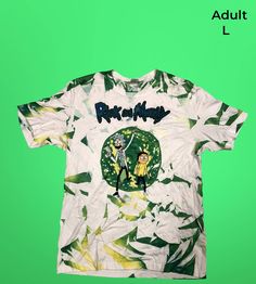 Introducing our Rick and Morty Sublimation Tie Dye Shirt! This hand-made shirt features bright, vibrant colors in a unique tie dye pattern that has never been seen before. Stand out from the crowd and show off your love for the hit TV show with this one-of-a-kind shirt. Perfect for fans of Rick and Morty who want to add a pop of color to their wardrobe. Get yours today and make a statement! Green T-shirt With All Over Print For Spring, Relaxed Fit Tie Dye T-shirt With Sublimation Print, Green All Over Print T-shirt For Spring, Green All-over Print T-shirt For Spring, Spring Acid Wash T-shirt With Sublimation Print, Fun Tie Dye Top With Graphic Print, Summer Graphic Tee With Sublimation Design, Acid Wash T-shirt With Custom Print, Cotton Sublimation T-shirt With Graphic Print For Summer