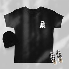 Ghost Halloween Toddler Shirt , Cute Ghost T-shirt , Funny Halloween Shirt for Kids , Halloween Party Funny Boo Ghost Shirt T-Shirt Details //  * 4.2 oz./yd² (US) 7 oz./L yd (CA), 100% airlume combed and ringspun cotton, 32 singles * Athletic Heather is 90/10 airlume combed and ringspun cotton/polyester * Pre-shrunk * Side seam * Tear away label Note // All apparel are made to order in house.  Designs are hand placed, so the placement may differ slightly from the picture in the listing. Unisex Halloween T-shirt With Screen Print, Novelty Black T-shirt With Character Print, Novelty Black T-shirt With Screen Print, Black Novelty T-shirt With Screen Print, Black Screen Print Novelty T-shirt, Black Novelty Short Sleeve Tops, Unisex Pre-shrunk Halloween T-shirt, Cute Halloween T-shirt For Streetwear, Unisex Black Halloween T-shirt