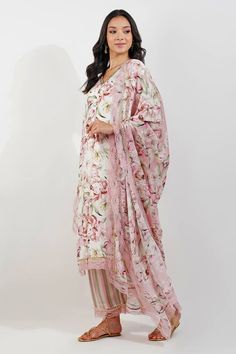 Ivory kurta with vintage floral print, embellished with sequin border and finished with lace work. Paired with stripe print pant and dupatta. - Aza Fashions Elegant Georgette Palazzo Set With Floral Print, Elegant Silk Palazzo Set With Floral Print, Elegant Wedding Kurta With Printed Motifs, Elegant White Salwar Kameez With Printed Motifs, White Salwar Kameez With Printed Motifs For Wedding, Wedding White Salwar Kameez With Printed Motifs, Straight Kurta Palazzo Set With Floral Print For Wedding, Floral Print Palazzo Set With Straight Kurta For Wedding, Elegant Silk Kurta With Floral Print