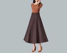 * A high-end long wool skirt with wide hem, very cool. * Made of wool blends, fully lined and with two side pockets. * Fixed waist with wide waistband and side invisible zipper. * Can custom make waist size and skirt length. * Material: Outer-50% wool, 50% polyester; lining-100% polyester * Washing instructions: Dry Clean Only * Size: True to US size, US 0-US 20 are available, you can let us know your usual size and height in your order. * Shipping: Free shipping Processing time : 5-7 Business d Flared Maxi Skirt For Fall Workwear, Flared Maxi Skirt For Fall Office Wear, Brown Maxi Skirt With Pockets For Fall, Brown Maxi Skirt For Workwear And Fall Season, Brown Maxi Skirt For Workwear In Fall, A-line Maxi Skirt For Fall Workwear, Brown Flared Maxi Skirt For Fall, Fall Solid Color Full Maxi Skirt, Brown A-line Maxi Skirt With Lining