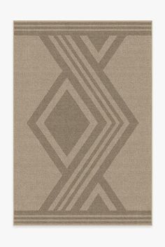 a beige rug with an abstract design on the bottom and sides, in grey tones