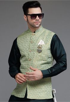 Art Silk Jacquard Nehru Jacket in Pastel Green This Chinese Collar Neck and Sleeveless Readymade attire is Enhanced with Buttons Do note: Brooch, Kurta and Footwear shown in the image is for presentation purposes only. Half to one inch may vary in measurement. (Slight variation in actual color vs. image is possible) Luxury Nehru Jacket For Eid Ceremonial, Luxury Formal Nehru Jacket For Spring, Luxury Nehru Jacket With Stand Collar For Formal Events, Luxury Nehru Jacket For Spring Formal Occasions, Luxury Designer Raw Silk Nehru Jacket, Luxury Silk Nehru Jacket With Zari Work, Luxury Nehru Jacket With Button Closure For Fall, Luxury Single Breasted Nehru Jacket For Winter, Luxury Tailored Nehru Jacket For Semi-formal Occasions