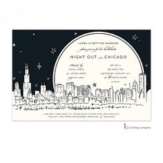 a black and white wedding card with the cityscape in the background at night