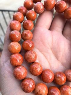 Vintage Translucent Orange Red Jadeite Jade Single Strand Bead Necklace ....Total of weights 167.5grams...Measure of necklace 22'' Length ...Measure of Bead 13.2MM...It's in very good condition. Hand-strung Orange Jewelry With Round Beads, Orange Hand-strung Jewelry With Round Beads, Orange Gemstone Beads Round Jewelry, Orange Gemstone Round Beads Jewelry, Red Coral Jewelry With Natural Stones In Round Beads, Orange Round Gemstone Bead Jewelry, Orange Round Gemstone Beads Jewelry, Hand-strung Orange Necklace, Hand-strung Round Red Coral Jewelry