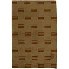 an area rug with brown and tan stripes