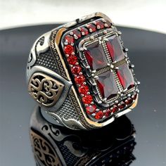 Silver Man Large Ruby Ring , Handmade Ottoman Style Red Stone Square Ring, Big Red Stone Ring , Zircon Stone Ring, 925k Sterling Silver Ring ★Item Details * Gender : Male / Female * Material : 925K Sterling Silver * Total weight : 42 Grams * Gemstone : Ruby  Stone ✔ Ready to Ship in 1-2 Business Days .. ✔ Shipped to the Worldwide 1-5 business days with free shipping... ✔ The product will be sent to you with a handmade wooden box to avoid any damage during shipping... ✔ Visit our store, browse other Men's jewelry, silver and gold collections, and find the perfect piece you're looking for... Click For Our Other Products https://www.etsy.com/shop/MercansilverTR?ref=simple-shop-header-name&listing_id=1003010735 Man Rings, Rubin Ring, Handmade Ottomans, Red Stone Ring, Ottoman Styling, Square Ring, Square Rings, Ruby Stone, Gold Collection