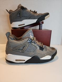 Durable High-top Air Jordan 4 For Sports, Fade-resistant High-top Air Jordan 4 For Sports, Fade-resistant Air Jordan 4 For Light Sports, Nike Air Jordan 4 Sports Shoes, Nike Air Jordan 4 For Sports With Branded Insole, Gray Air Jordan 4 Casual Sports Shoes, Gray Air Jordan 4 Casual Sneakers, Casual Gray Air Jordan 4 For Sports, Nike Air Jordan 4 High-top For Sports