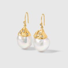 "Large, White, 54ct Baroque Pearl Earrings with Diamonds, in 24kt Gold by Prehistoric Works of Istanbul, Turkey. Length: 34mm (1.4\"); Width: 15.5mm (.6\"). Throughout the centuries, pearls have been associated with wealth, femininity, purity, wisdom, patience and peace. Due to their appearance, they have often been compared to the moon, and are said to have a calming, protective and strengthening effect on the wearer. It is also the birthstone for the month of June." Yellow Gold High Luster Drop Earrings, Luxury Pear-shaped Earrings For Evening, Luxury Teardrop Earrings With High Luster, Classic Hammered Earrings For Formal Occasions, Luxury Yellow Gold Drop Pearl Earrings, Luxury Hammered Earrings For Anniversary, Elegant Hammered Earrings For Wedding, Elegant Hammered Wedding Earrings, Exquisite Yellow Gold Earrings With High Luster