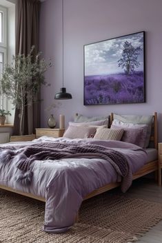 a bedroom with purple walls and wooden bed frame in front of a large painting on the wall