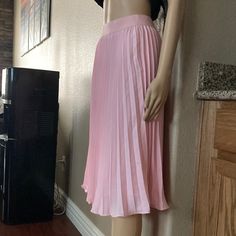 Kate Kasin Brand Nwt Is Very Elegant Baby Pink Pleated Skirt In Size Small Sophisticated Looking Skirt Pleated Flared Mini Skirt In Feminine Style, Chic Non-stretch Pink Skirt, Pink Non-stretch Skirt For Spring, Non-stretch Pink Skirt For Spring, Feminine Solid Color Midi Skirt, Feminine Relaxed Mini Pleated Skirt, Feminine Mini Pleated Skirt With Relaxed Fit, Non-stretch Lined Mini Pleated Skirt, Pink Non-stretch Pleated Maxi Skirt