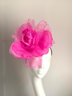 Large hot pink flower hat This amazing large hot pink flower hat is made from organza and velvet fabric. The hat sits on the black fabric-covered headband to which I attached a comb so it will sit steadily on your hair. A large hot pink flower hat will be an amazing accessory to compliment your outfit. It will fit the average head size. You can wear this amazing hat at the wedding, Christening, Horse races, and any other special occasion. Enjoy and please have a look in my shop for more hats and Pink Flower Headpiece For Wedding, Pink Flower Fascinator For Wedding, Pink Flower Headpieces For Wedding, Pink Flower Headpiece For Kentucky Derby, Pink Fascinator With Handmade Flowers For Royal Ascot, Pink Handmade Flowers Fascinator For Royal Ascot, Pink Flower Fascinator For Kentucky Derby, Pink Flower Mini Hat For Garden Party, Pink Mini Hat With Handmade Flowers