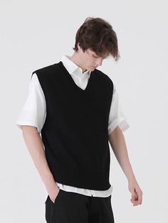 Editor's NotesThis versatile V-neck vest is knitted from weighty acrylic and works well for all year round. It's minimally designed with ribbed edges and oversized silhouette for comfortable layering over.- V-neck- Sleeveless- Ribbed edges- Oversized fit- Unisex wearMeasurements (in.) Size: M / L- Total Length: 25.6 in. / 26.8 in.- Shoulder: 19.7 in. / 20.5 in. - Chest: 24.2 in. / 25.0 in. * Model info: Man - 6' 1.6, 147.7 lbs, Fitting size L / Woman - 5' 6.1, 105.8 lbs, Fitting size MComposition & Care- 100% Acrylic- Recommend dry clean- Do not wash or tumble dryDesigner- by PEPPERSEASONING Ribbed Vest For Winter Layering, Black Knit Vest For Workwear, Black Knit Vest For Work, Black Knit Sweater Vest For Work, Classic Solid Color V-neck Sweater Vest, Solid V-neck Sweater Vest For Work, Black Ribbed Sweater Vest For Fall, Fall Black Ribbed Sweater Vest, Casual Ribbed Vest For Work