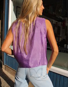 Vintage silk top in purple. Sleeveless. Scoop neckline. Size M/L, UK 12-18 / EU 40-46. Measurements- 40"(102cm) bust - 20"(51cm) top length. Material- Silk Condition - Excellent. Care - Handwash Cold Handpicked, repaired and ready to wear. This is an original vintage item, not new and minor signs of wear & age are expected, we will highlight any major flaws.Model is a UK 6/8 and is 5'7" tall Chic Purple Summer Tops, Purple Sleeveless Summer Vest, Summer Sleeveless Purple Vest, Purple Sleeveless Vest For Summer, Chic Purple Tank Top For Spring, Chic Purple Silk Top, Chic Fitted Purple Camisole, Fitted Purple Silk Tops, Purple Sleeveless Vest Top